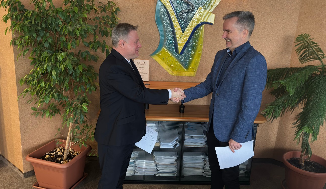 Pán Kmeť podáva ruku